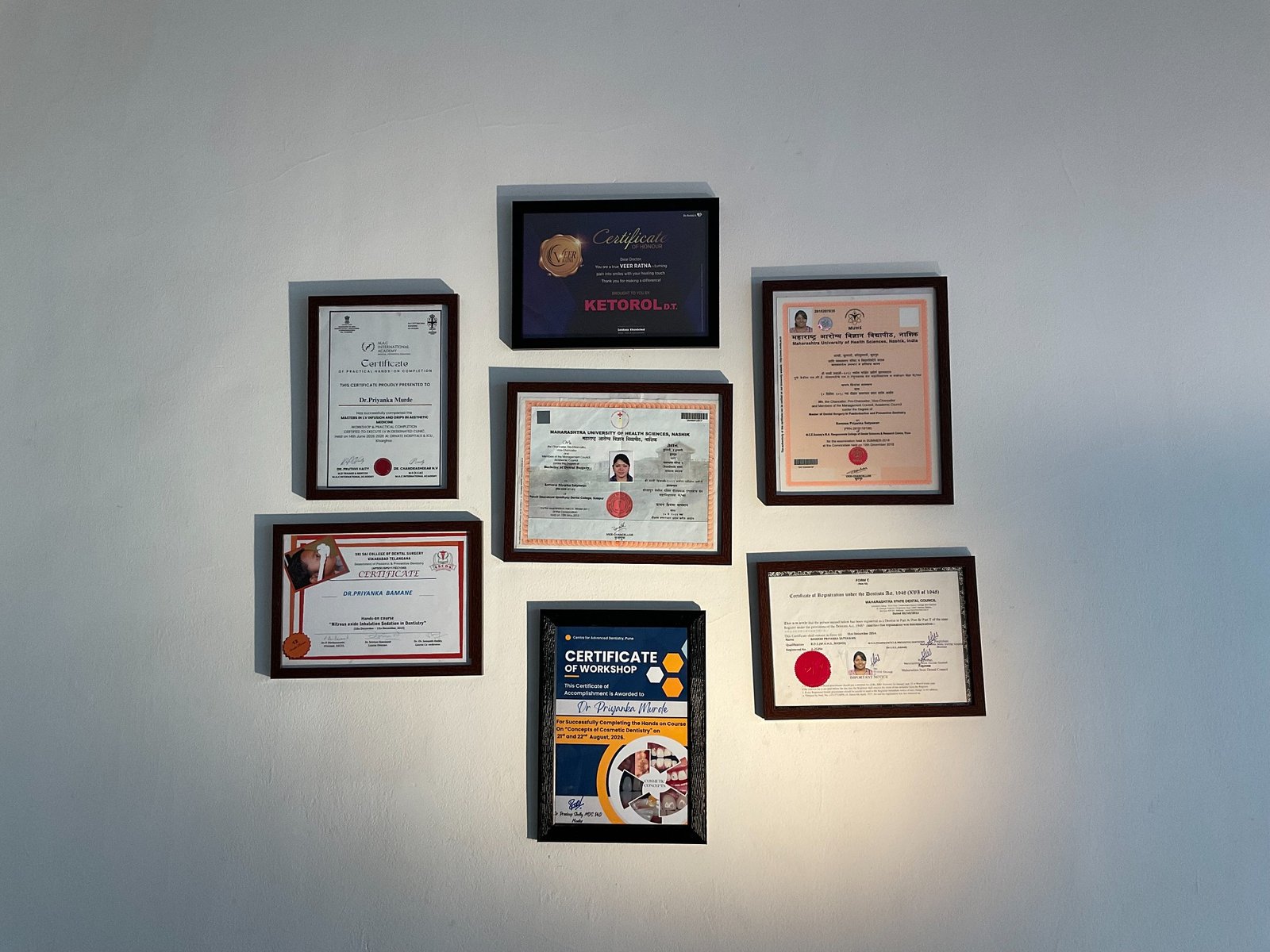 Dr Priyanka’s professional certificates displayed at Tooth Paradise