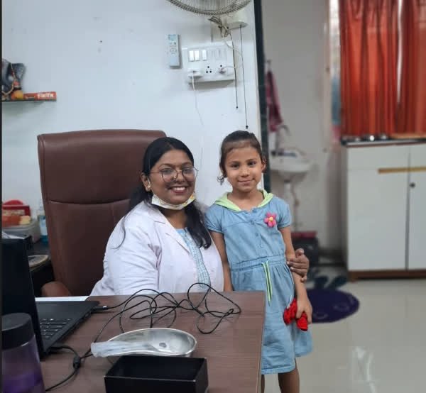 Dr. Priyanka and a patient at Tooth Paradise